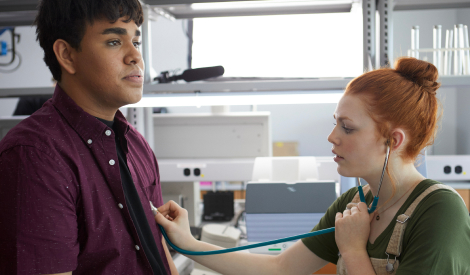 girl listening to her partner's heartbeat